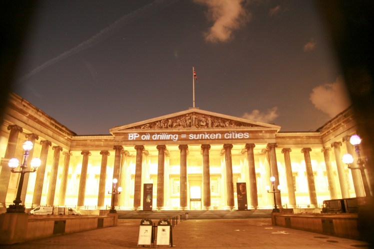Ahead of BP AGM, campaigners project "Drop BP" onto the British Museum's iconic facade. Photo by Diana More.