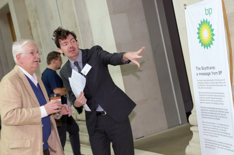 Fake BP staff talk to visitors and press. Photo by Diana More